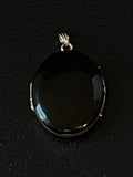 gold black enamel pendant