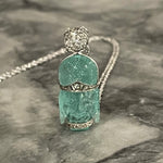 platinum diamond and carved emerald buddha pendant