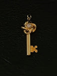 gold love knot key charm