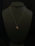 diamond skull and cross bones necklace