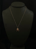 diamond skull and cross bones necklace