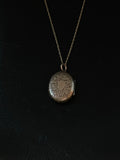 rose gold engraved locket