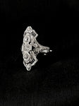 white gold filigree diamond and synthetic sapphire elongated dinner ring