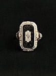 white and rose gold filigree with onyx and diamond ring