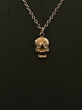 memento mori gold skull pendant