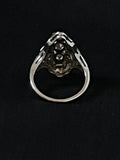 white gold diamond and synthetic sapphire navette ring