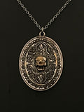 memento mori floral pendant