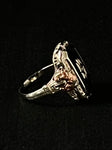 white and rose gold filigree with onyx and diamond ring