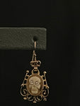 memento mori openwork earrings