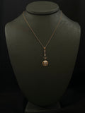 memento mori linear pendant