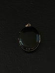 gold black enamel pendant