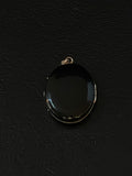 gold black enamel pendant