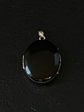 gold black enamel pendant