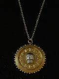 memento mori scalloped pendant