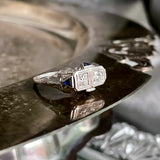 white gold diamond duette ring with synthetic sapphires