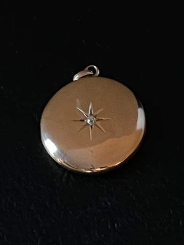 gold diamond circular pendant