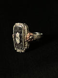 white and rose gold filigree with onyx and diamond ring